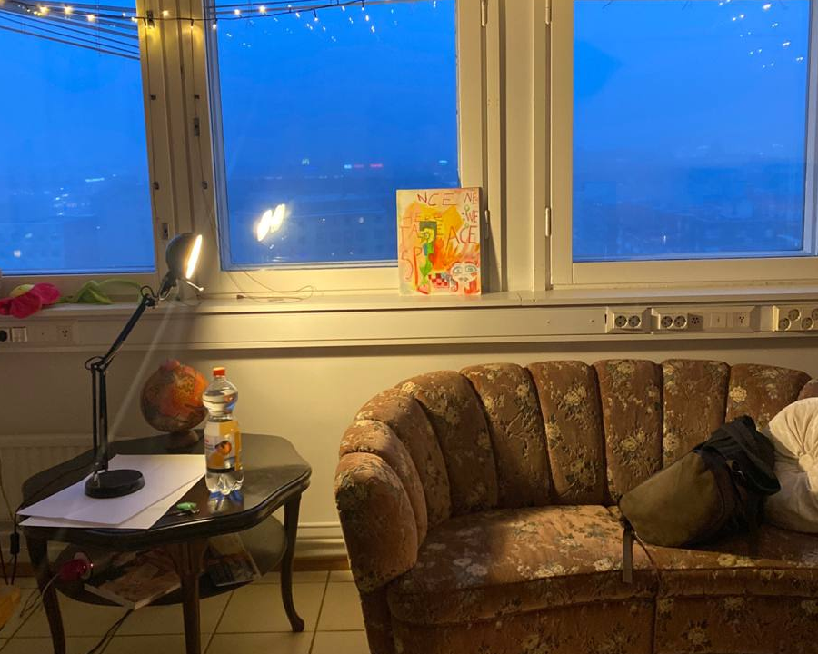 comfy sofa and blue moment outside the window